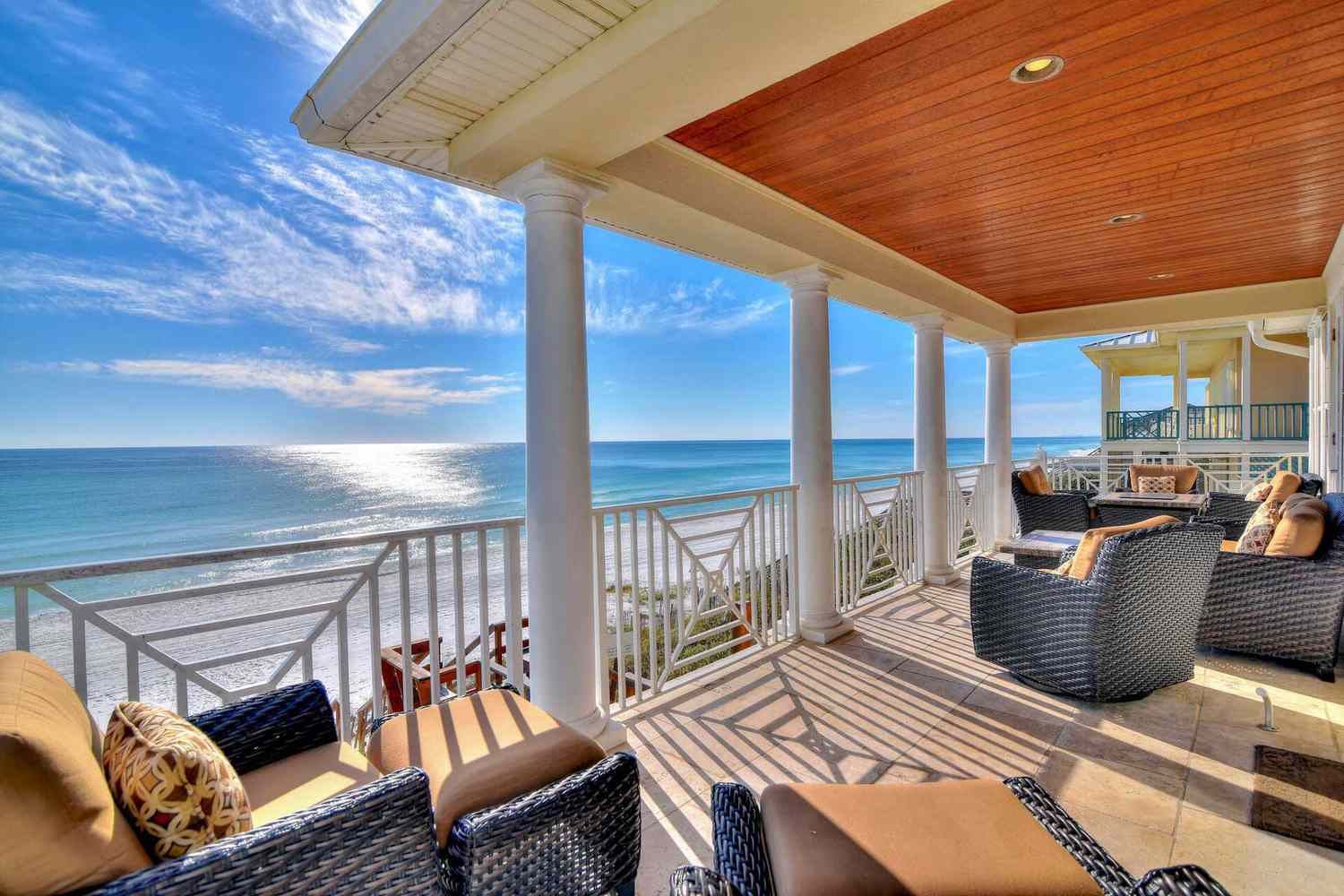 Gulf-front luxury home balcony overlooking the beach